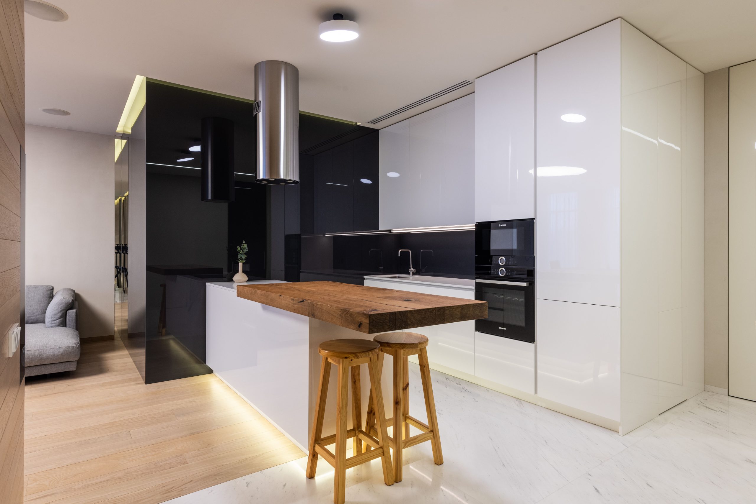 Appartement moderne cuisine glossy et salon confortable